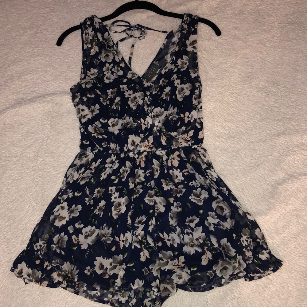 Navy floral romper with satin lining